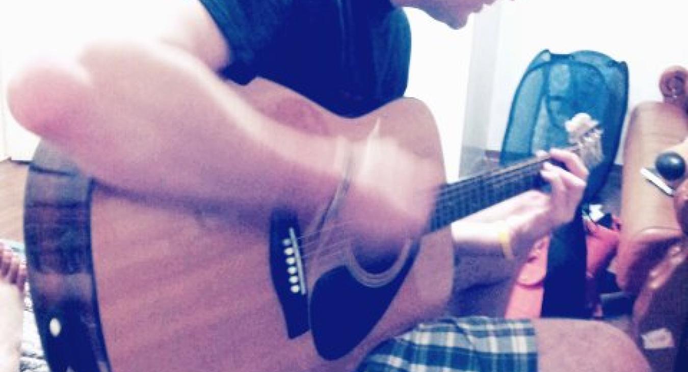 Playing guitar